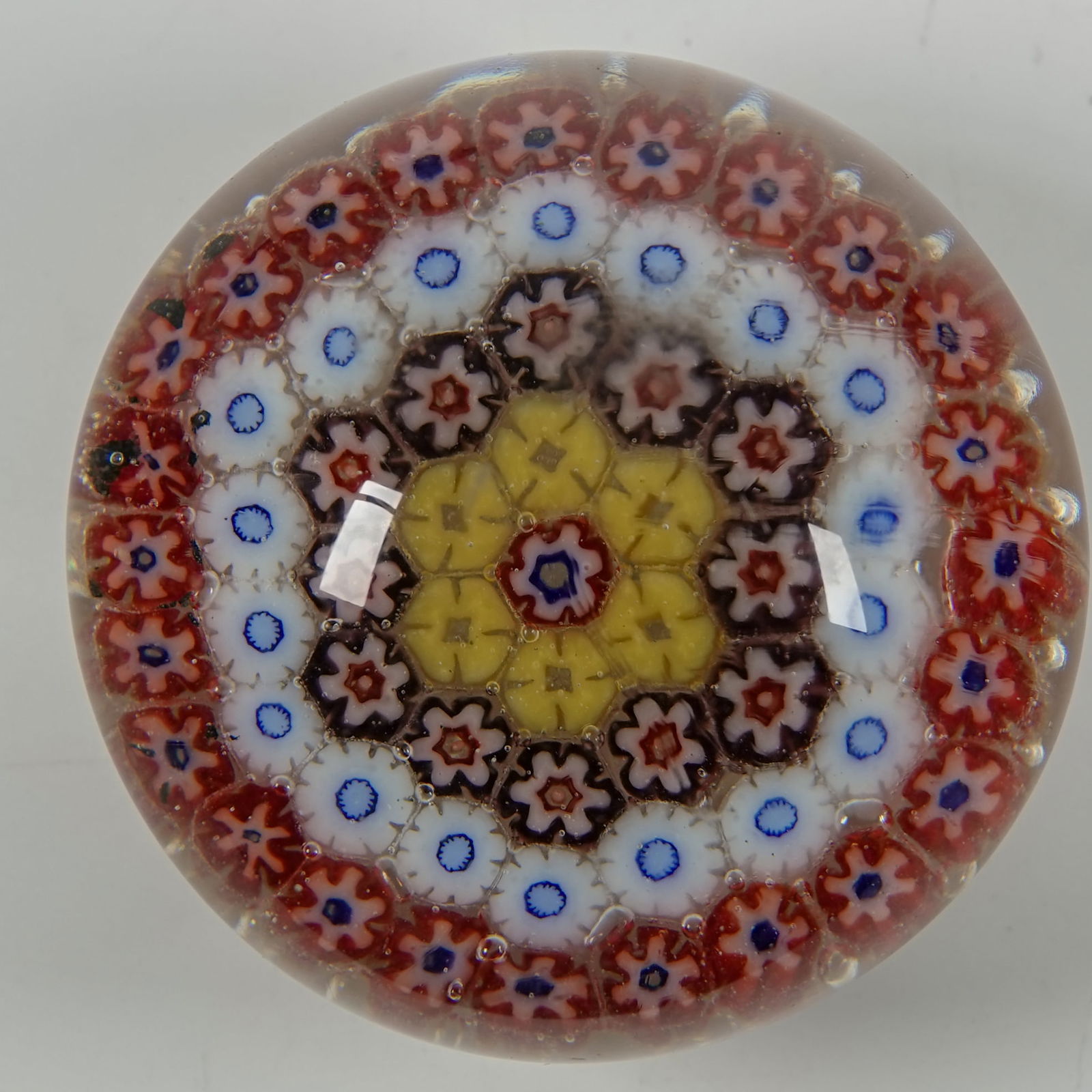 PAPERWEIGHT, Chinese. Antique.: PAPERWEIGHT, Chinese. Concentric ring millefiori pattern. China, circa 1920-1935. Mint. 2-1/2" width, 1-7/8" height.