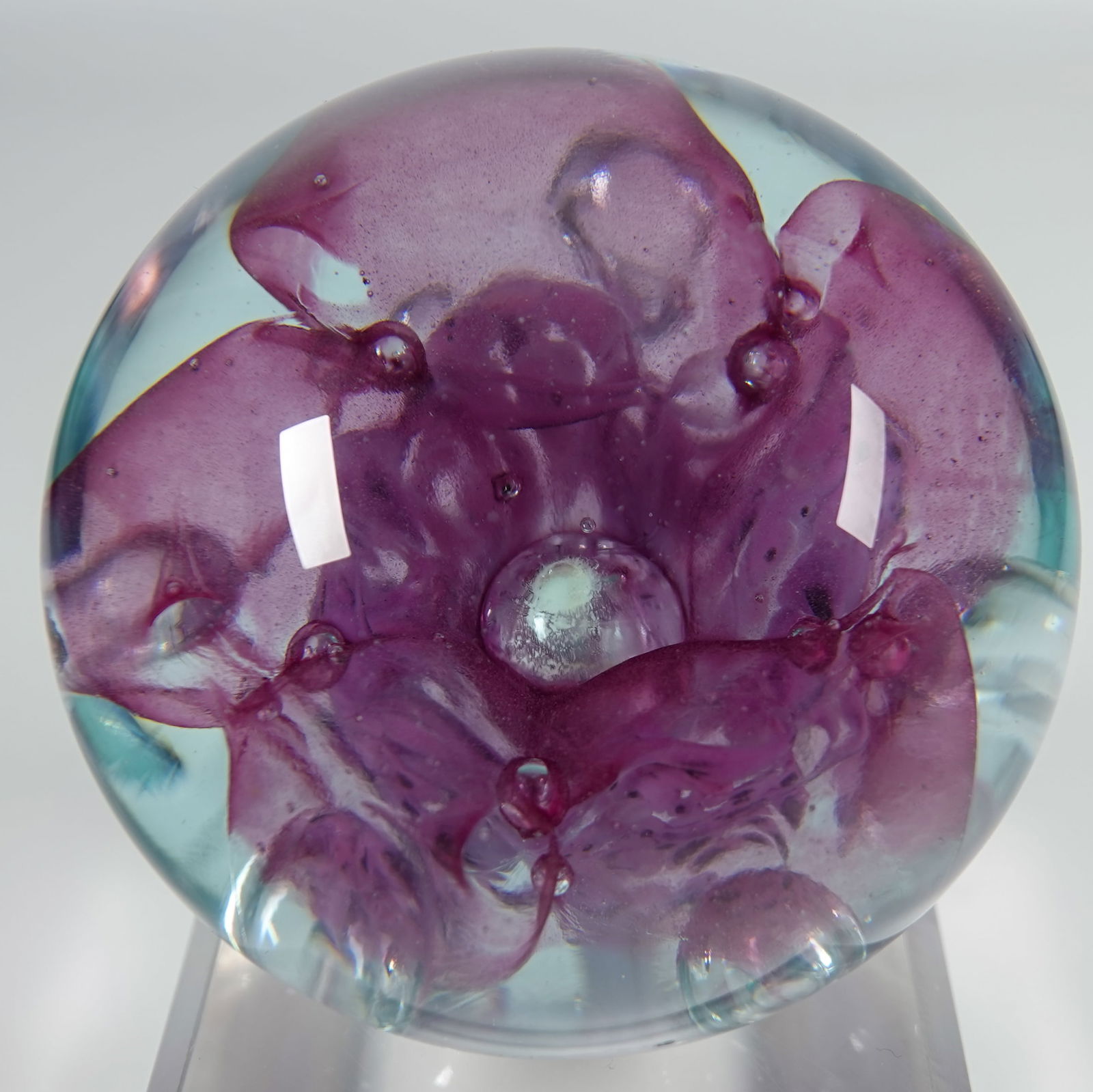 PAPERWEIGHT, Roger Vines. Mount St Helens Ash.: PAPERWEIGHT, Roger Vines. Interior design has a coating of Mount St. Helens ash on it. Signed on bottom "MSH Ash Vines 1993. 3" width, 2-1/2" height. Mint.