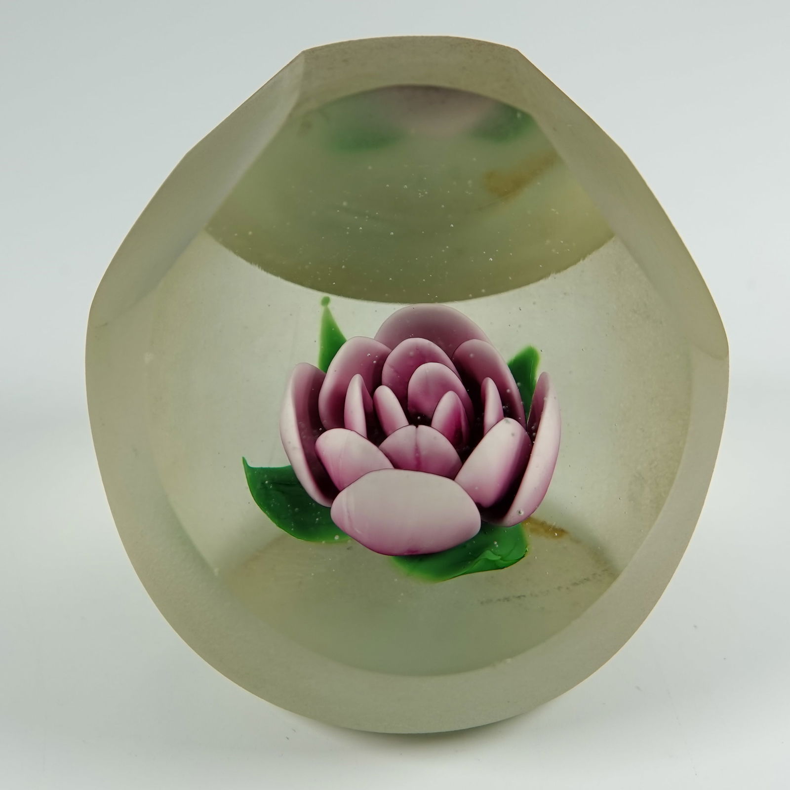 PAPERWEIGHT, Robert Grablow.: PAPERWEIGHT, Robert Grablow. Millville Crimp Rose in clear glass. Faceted and partly ground to a matte finish. See images. Signed on the bottom "R Grablow 1986". 3" width, 3" height.