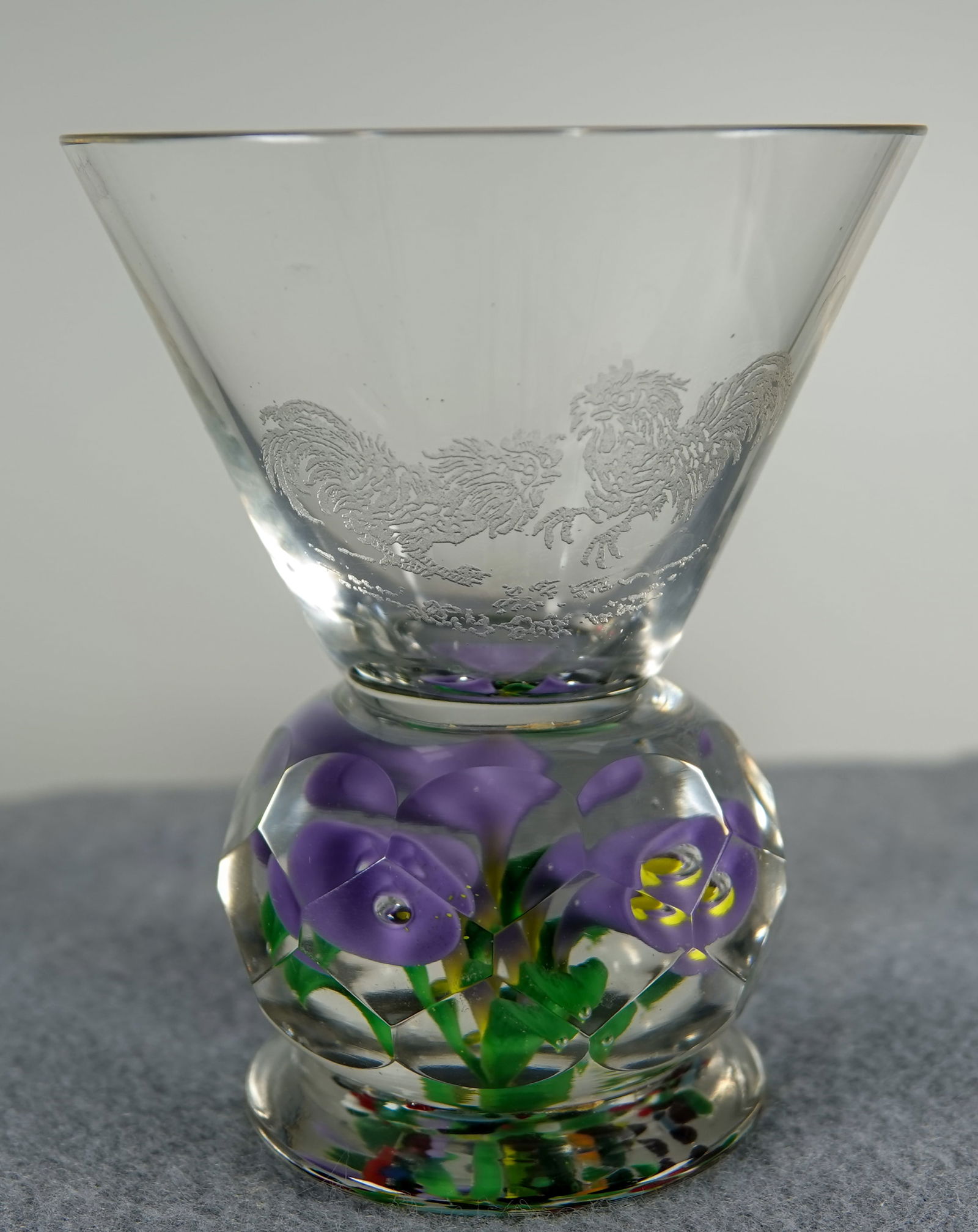 PAPERWEIGHT, Czechoslovakia. Antique.: PAPERWEIGHT, Czechoslovakia. Glass cup with a paperweight base. Base is typical Czech design of flowers growing out of frit. Faceted paperweight. Bowl of the cup is engraved with two roosters fighting