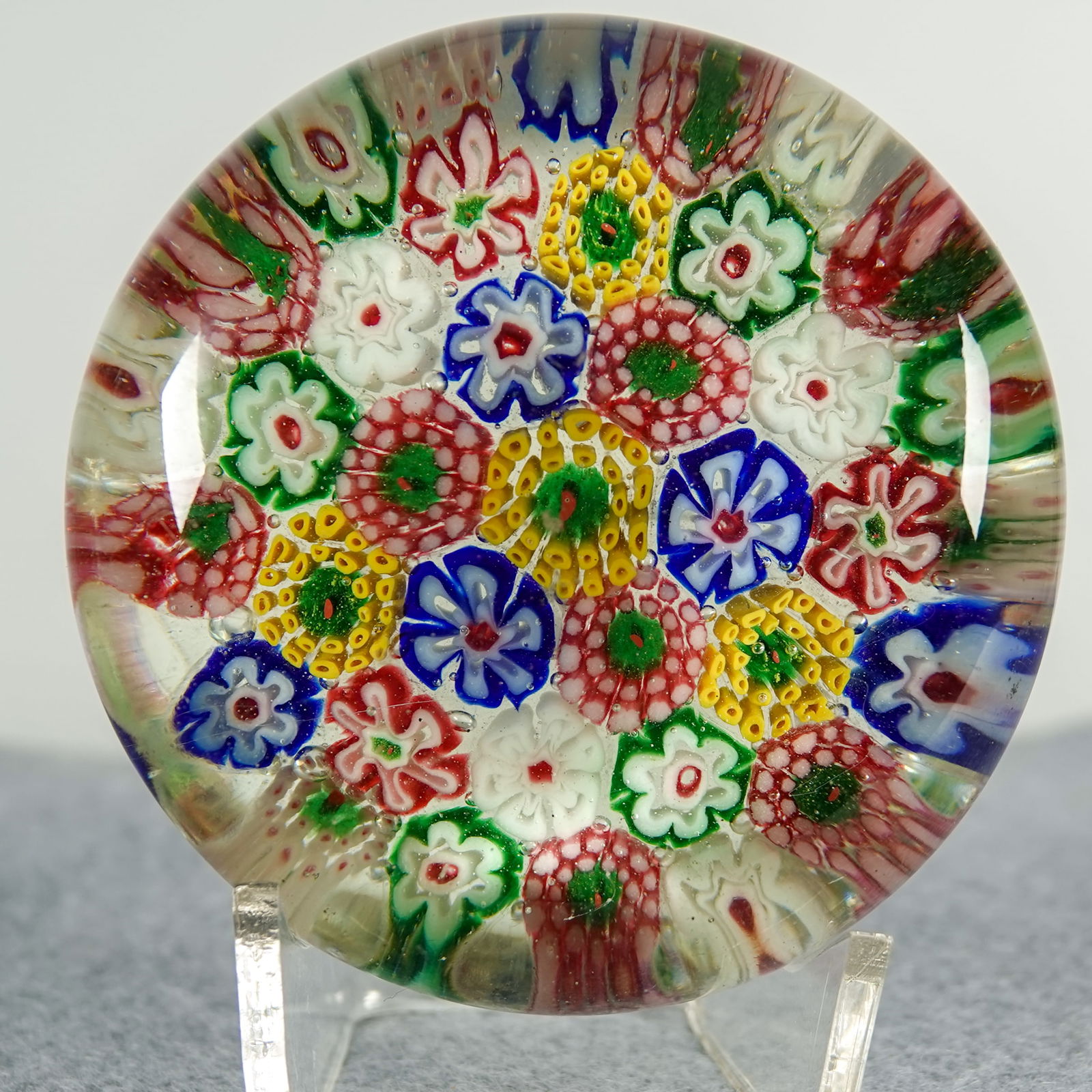 PAPERWEIGHT, Chinese. Antique.: PAPERWEIGHT, Chinese. Concentric ring millefiori pattern. China, circa 1920-1935. Mint. 2-5/8" width, 1-1/4" height.