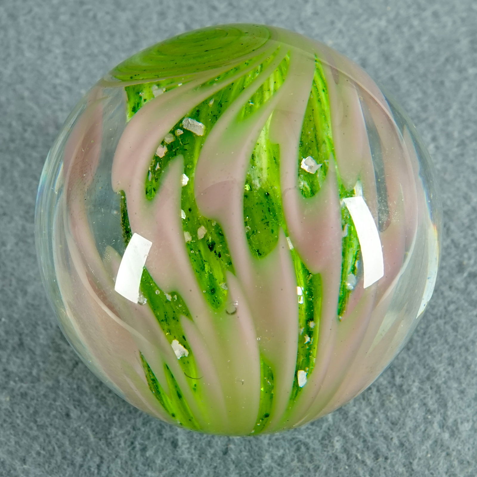 CONTEMPORARY HANDMADE, Sam Hogue. 1-13/16". Mint (9.9).: CONTEMPORARY HANDMADE, Sam Hogue. Solid Core covered with mica. Outer layer is raked bands. Compare to the marble in Lot 244. Signed "Sam Hogue 2011". 1-13/16". Mint (9.9).