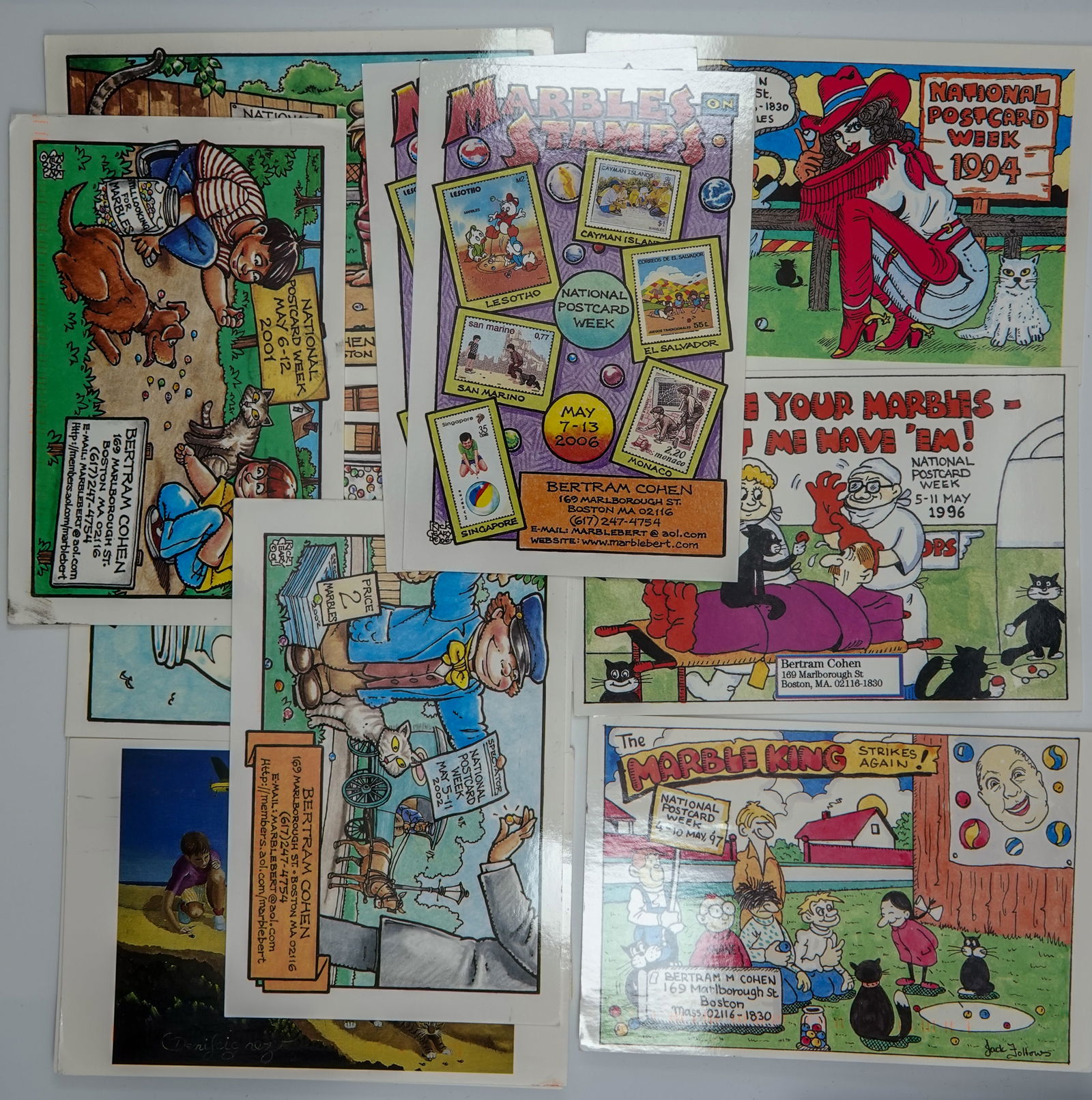 MISCELLANEOUS, Postcard. 11 Bert Cohen National Postcard Week postcards.: MISCELLANEOUS, Postcard. Lot of eleven items. All are advertising postcards depicting marbles or marble players commissioned by Bert Cohen for National Postcard Week. Nice different weeks from 1994 th