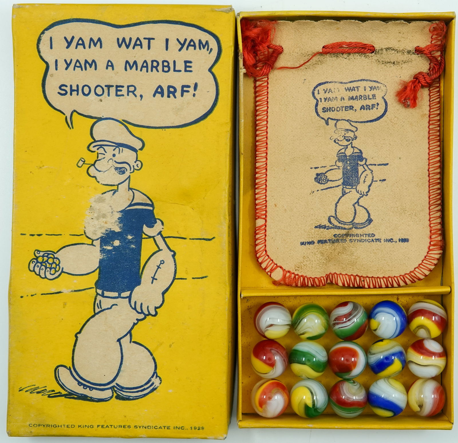 AKRO AGATE COMPANY, Original Package. Popeye Box.: AKRO AGATE COMPANY, Original Package. An original box. Original Yellow Popeye Box with original pouch and with fifteen Popeye Corkscrews. The box has some water staining on the top, and apparently had