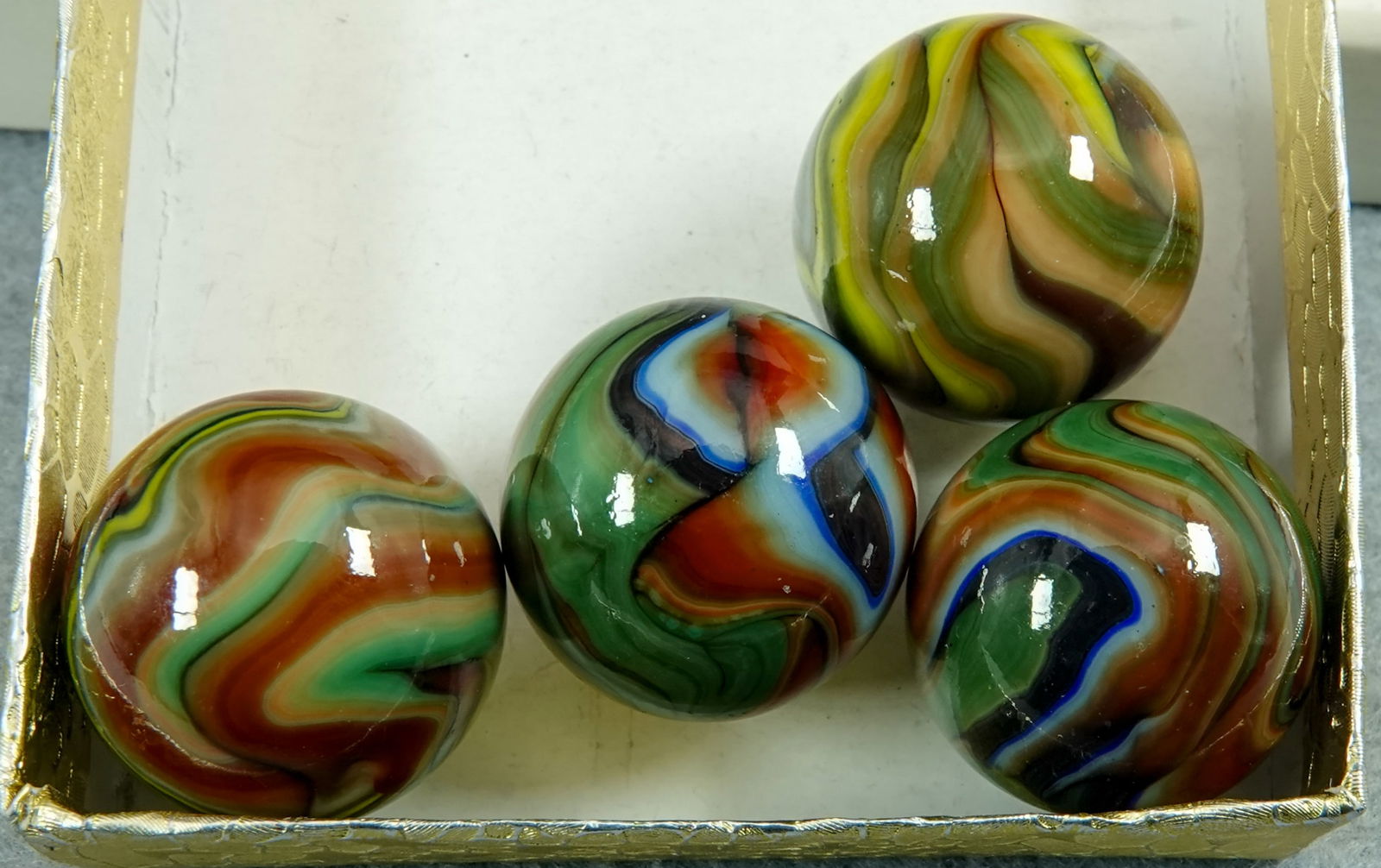 JABO/SAMMY/DAS, Swirl. 4 marbles. Megan Kasmir Flames.: JABO/SAMMY/DAS, Swirl. Lot of four marbles. All are Jabo Megan Kasmir Flames. 3/4" to 25/32". Mint.