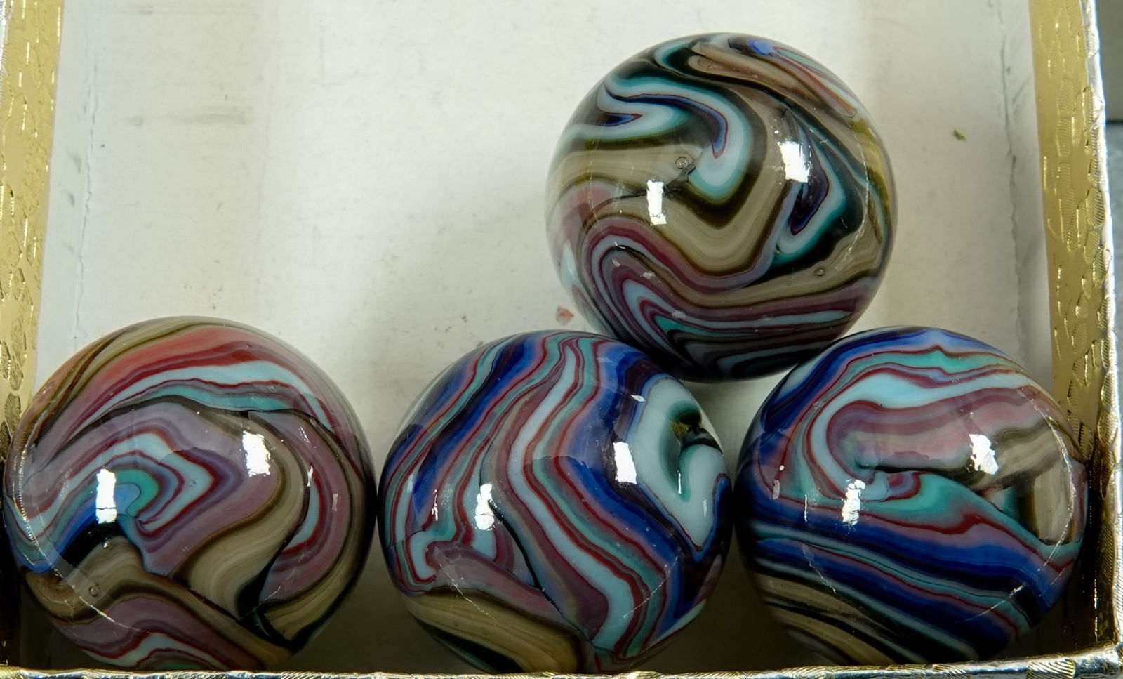 JABO/SAMMY/DAS, Swirl. 4 marbles. Jabo Odyssey+.: JABO/SAMMY/DAS, Swirl. Lot of four marbles. All are Jabo Odyssey+ 23/32". Mint.
