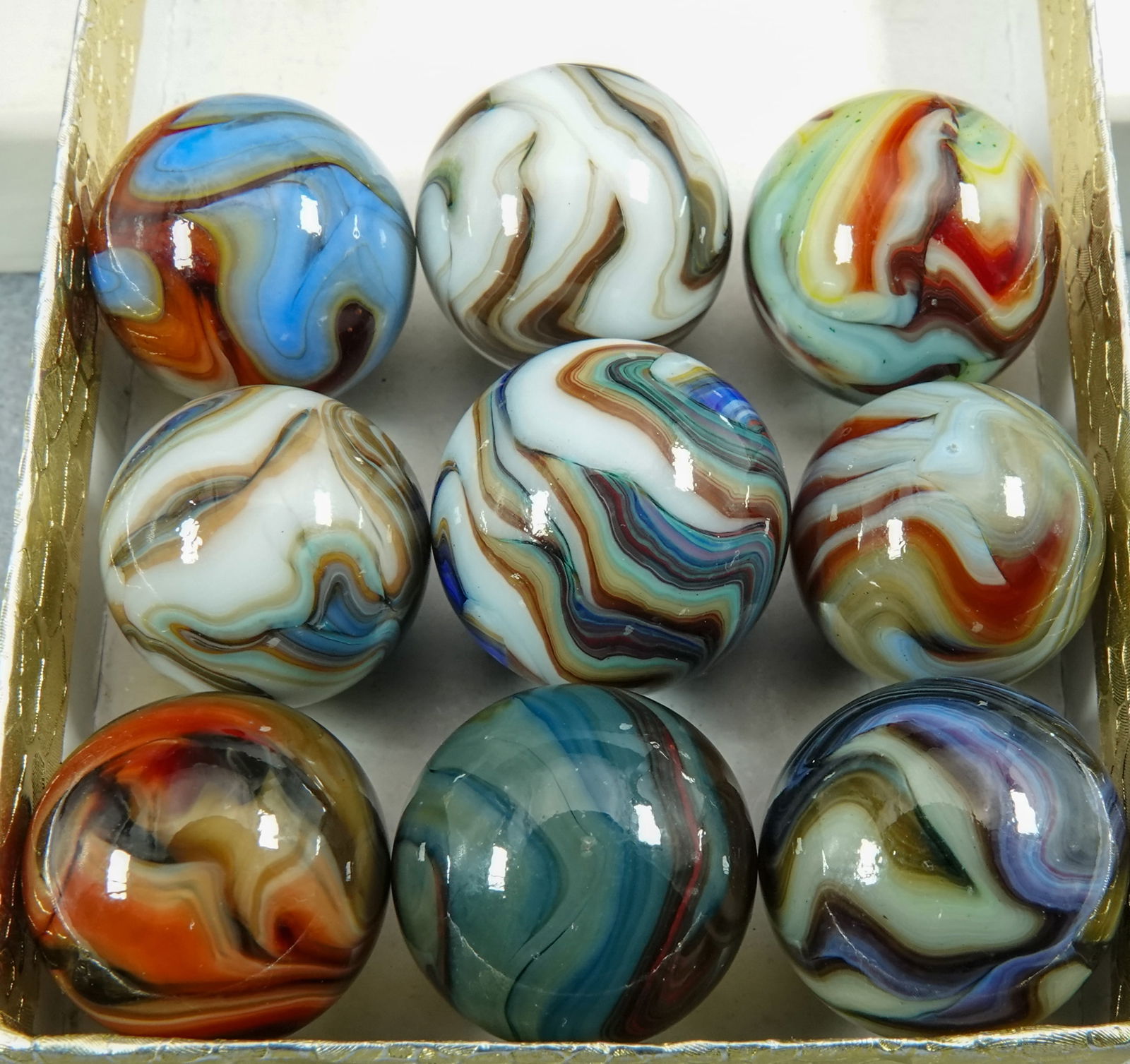 JABO/SAMMY/DAS, Assorted. 6 marbles. Jabo Flame.: JABO/SAMMY/DAS, Assorted. Lot of six marbles. All are Jabo Flame. 11/16" to 25/32". Mint.