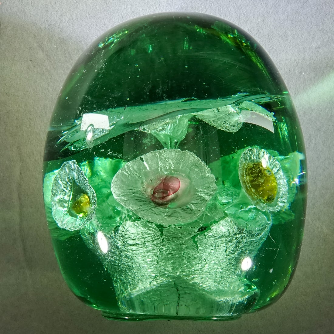 PAPERWEIGHT, J. Kilner. Victorian Dump Weight. Antique.: PAPERWEIGHT, J. Kilner. Victorian dump weight with mica flowers and flower pot inside. Side flowers have yellow, white or cranberry centers. There is a subsurface moon on the side right at the level