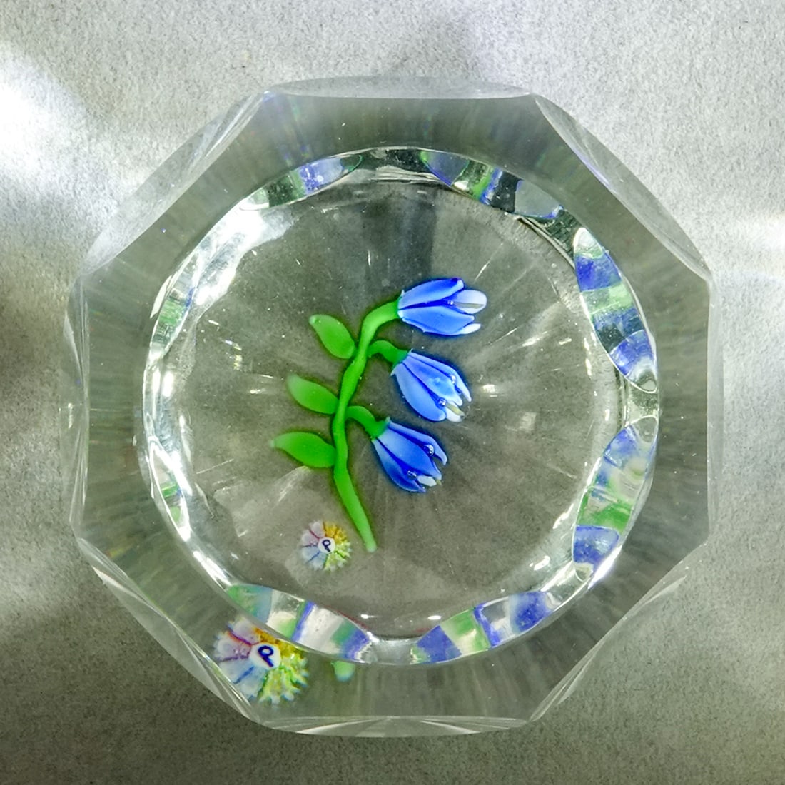 PAPERWEIGHT, Perthshire Paperweights.: PAPERWEIGHT, Perthshire Paperweights. Perthshire 1978C Limited Edition paperweight. Scottish Bluebells. Flowers with a "P" signature cane. Viewing window on top. Eight viewing windows around the weigh