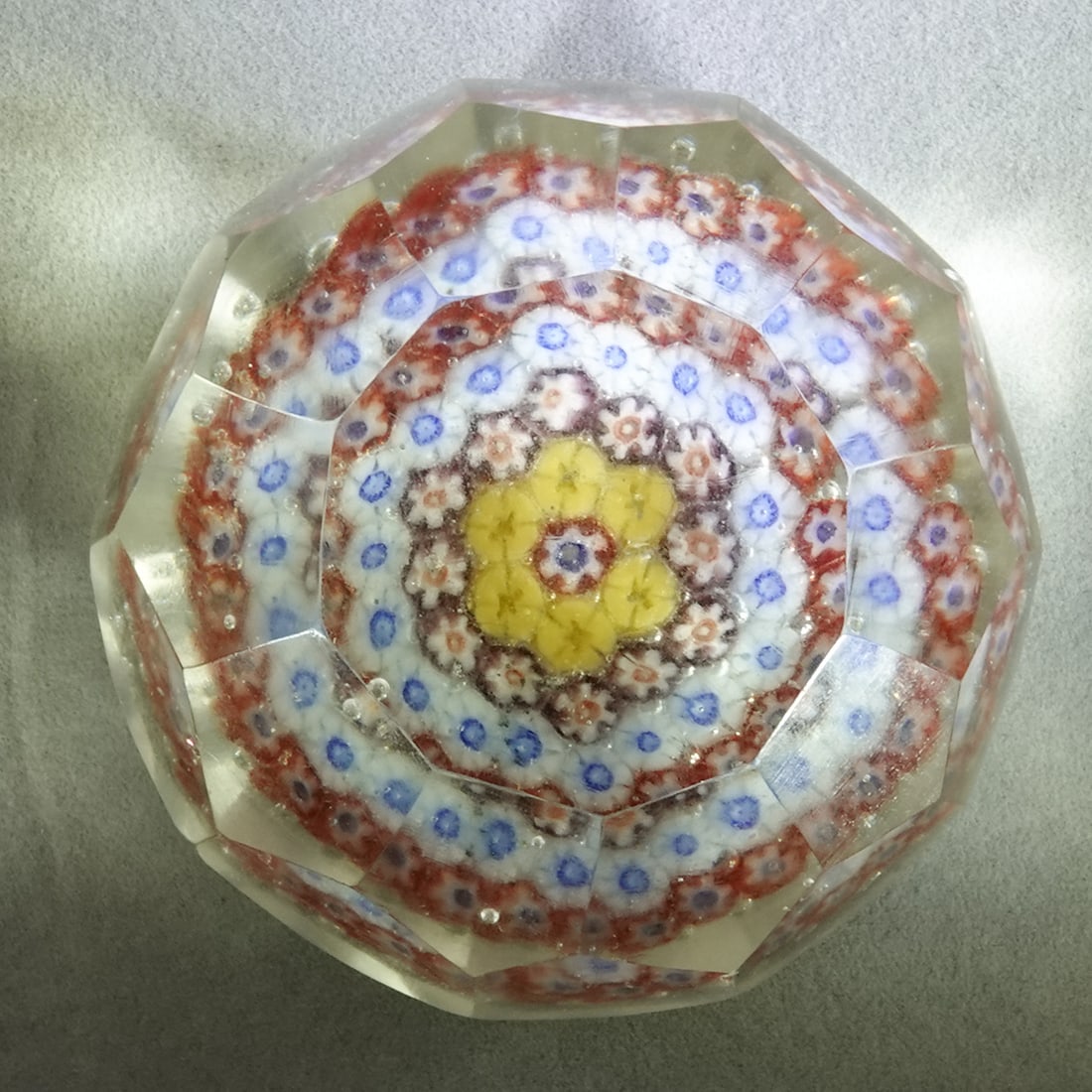 PAPERWEIGHT, Chinese. Antique.: PAPERWEIGHT, Chinese. Concentric rings. High dome. Four rows of ten facets around the paperweight and a viewing window at top. Hard to find these larger faceted ones. China, circa 1920-1940. 2-1/2"