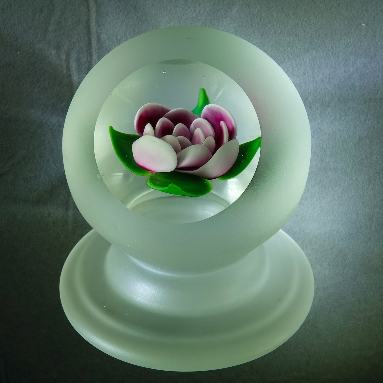 PAPERWEIGHT, Robert Grablow.: PAPERWEIGHT, Robert Grablow. Millville Crimp Rose pedestal weight. Nice viewing window, remainder is ground matte finish. Signed on bottom "R Grablow 1991". 3" wide, 1-3/4" tall .