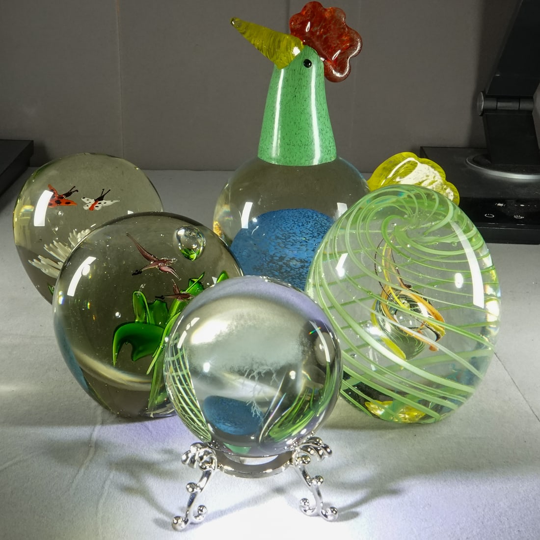 PAPERWEIGHT, Assorted. 5 modern Chinese.: PAPERWEIGHT, Assorted. Lot of five items. All are modern Chinese paperweights. Various styles. Laserline is a cloud with lightning. See images .