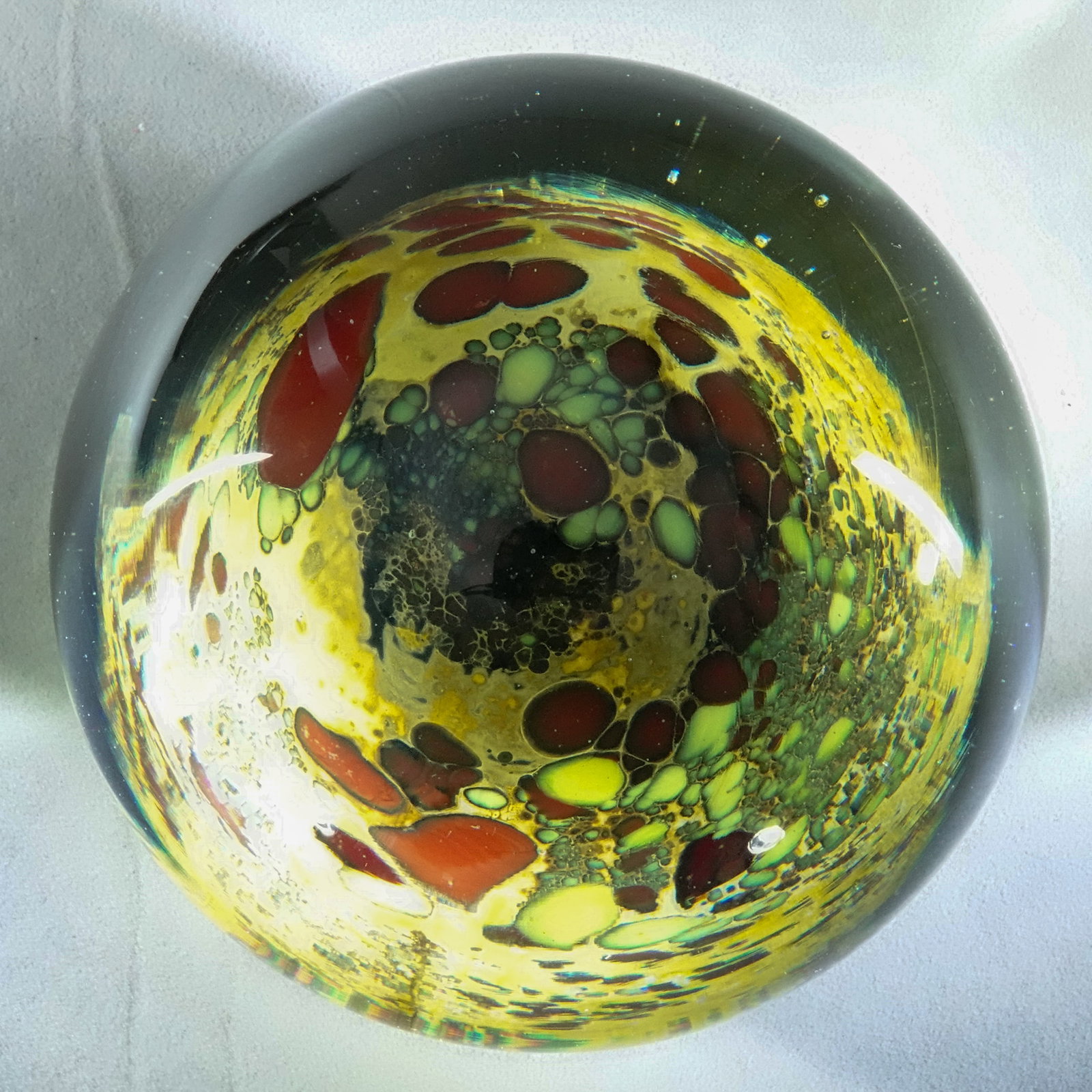 PAPERWEIGHT, Richard.: PAPERWEIGHT, Richard. Planet type. Signed somewhat illegibly. First name is Richard. Last name is illegible, beginning with either an O or a D. 4" wide, 3-1/2" tall .