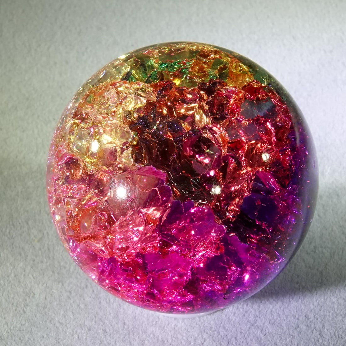 CONTEMPORARY HANDMADE, Unsigned. 1-9/16". Mint (9.9).: CONTEMPORARY HANDMADE, Unsigned. Glass sphere of a rainbow of colors and filled with internal fractures. Like a fried marble. Unsigned, artist unidentified. 1-9/16". Mint (9.9).