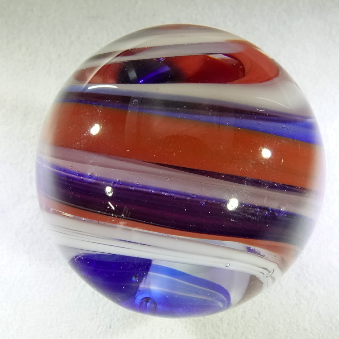 CONTEMPORARY HANDMADE, Unsigned. 1-1/2". Near Mint(+) (8.9).: CONTEMPORARY HANDMADE, Unsigned. Slag type. Unsigned, artist unidentified. A couple tiny pinpricks. 1-1/2". Near Mint(+) (8.9).