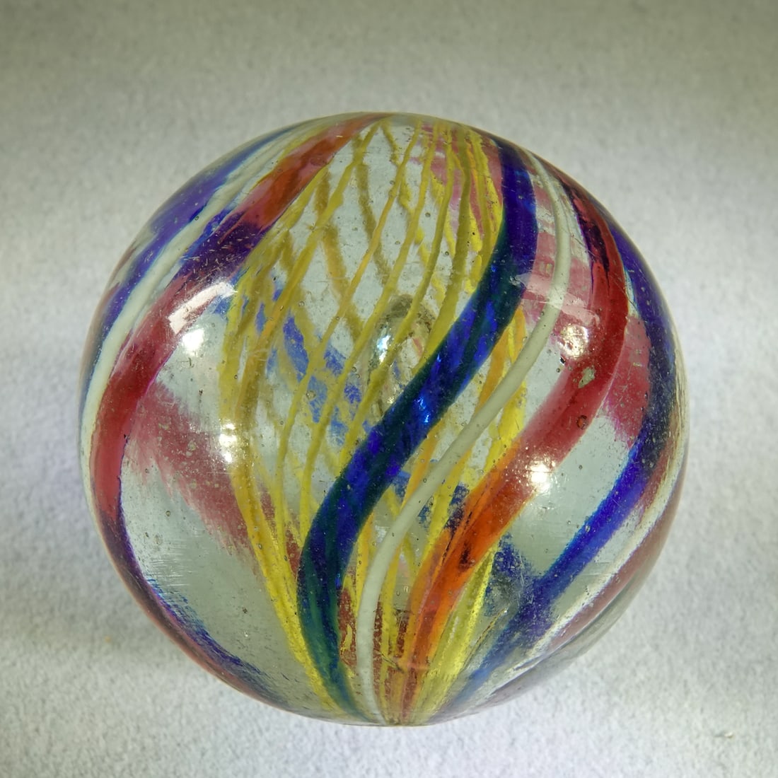 SWIRL, Latticinio Core. 1-9/16". Mint (9.8).: SWIRL, Latticinio Core. Yellow Latticinio Core. In great shape. Germany, circa 1860-1920. 1-9/16". Mint (9.8).
