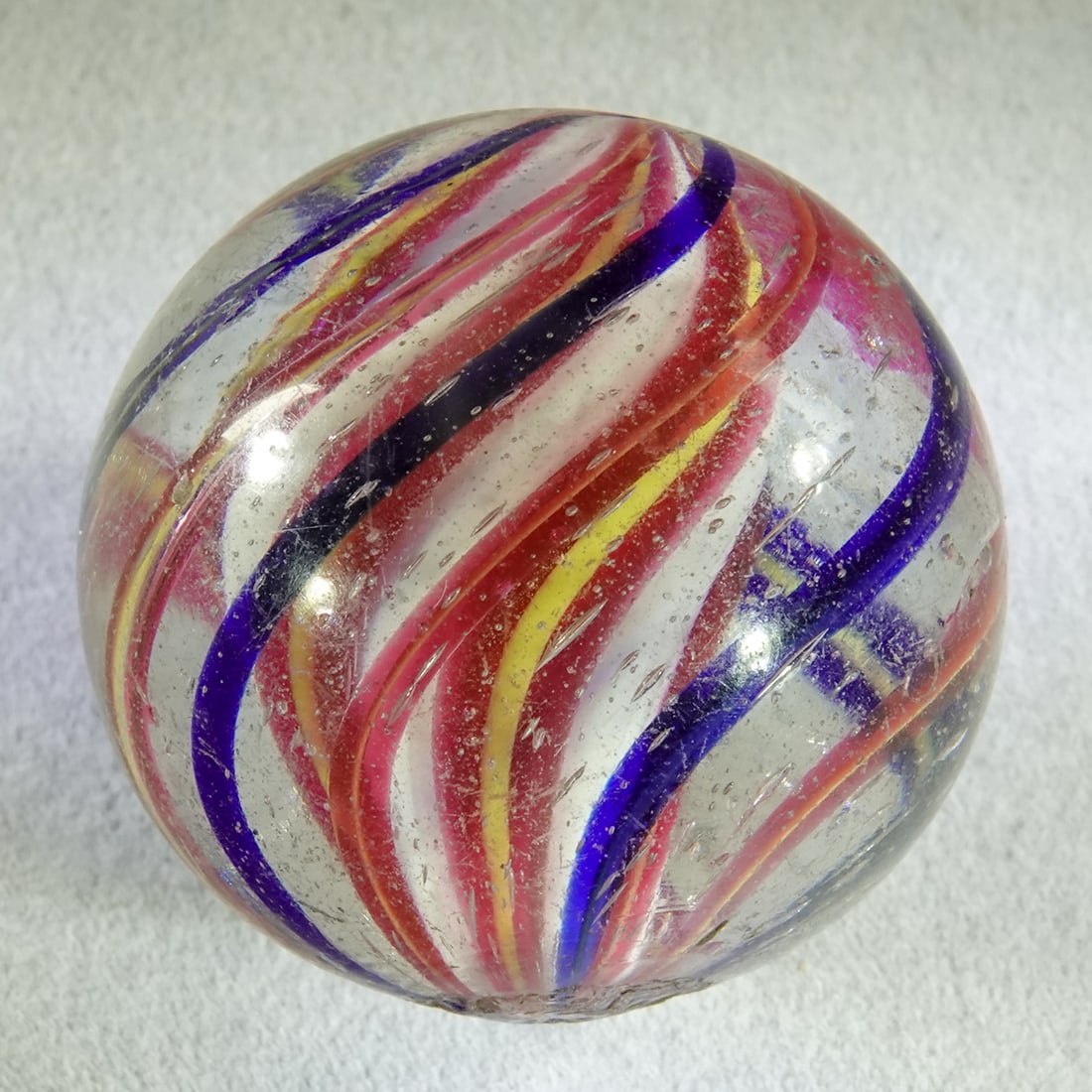 SWIRL, Solid Core. 1-3/16". Mint(-) (9.2). - 2