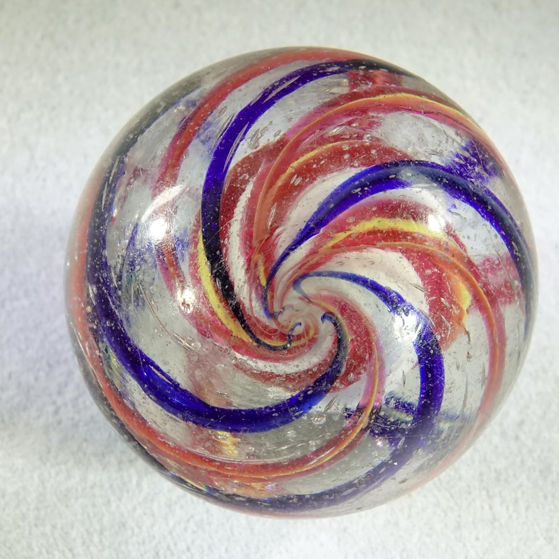 SWIRL, Solid Core. 1-3/16". Mint(-) (9.2). - 5