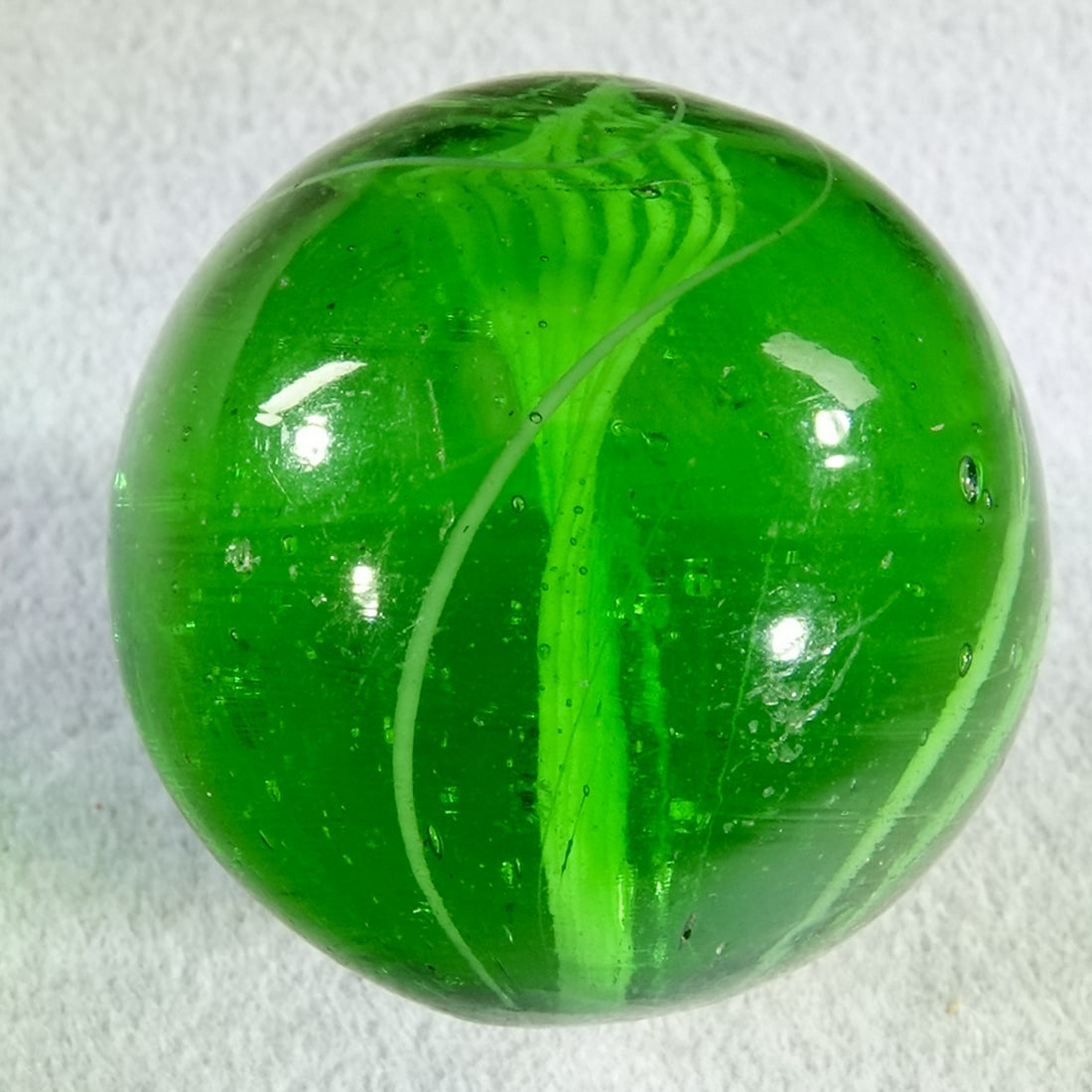 SWIRL, Ribbon Core. 27/32". Mint (9.8). - 2