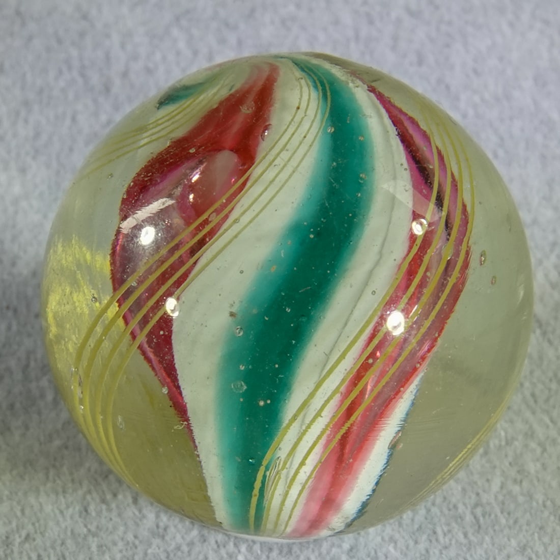 SWIRL, Solid Core. 25/32". Mint(-) (9.2). - 2
