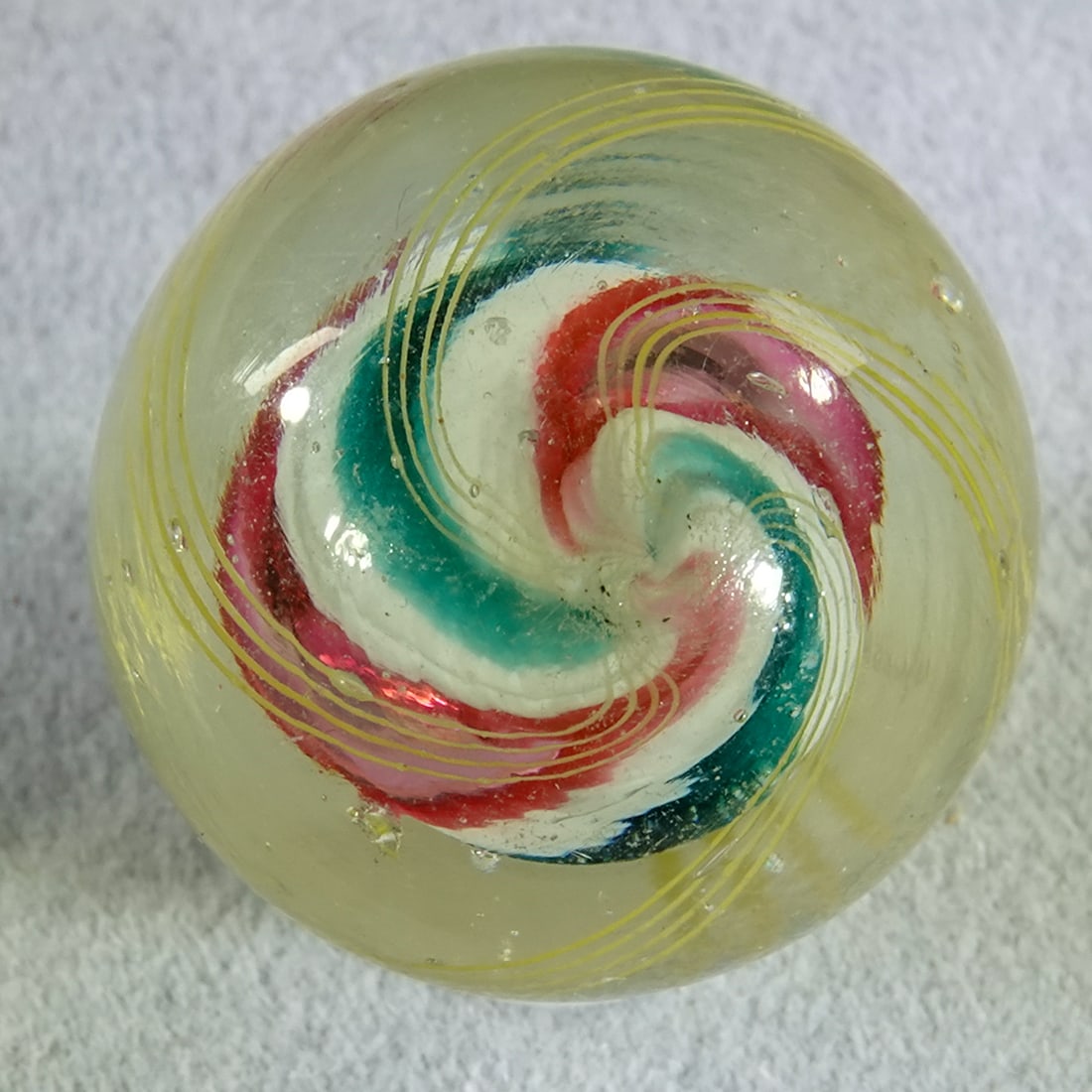 SWIRL, Solid Core. 25/32". Mint(-) (9.2). - 5