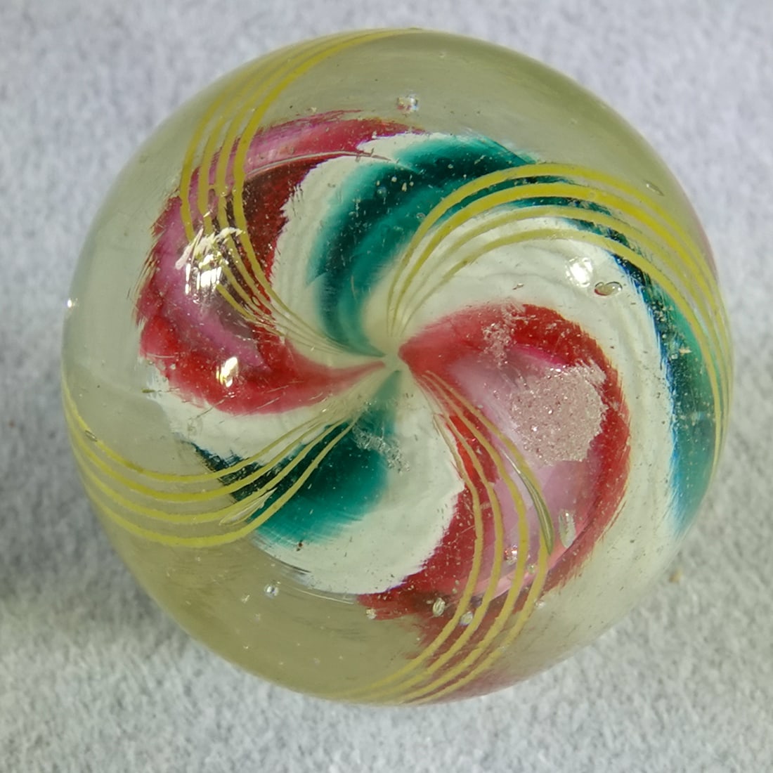 SWIRL, Solid Core. 25/32". Mint(-) (9.2). - 6