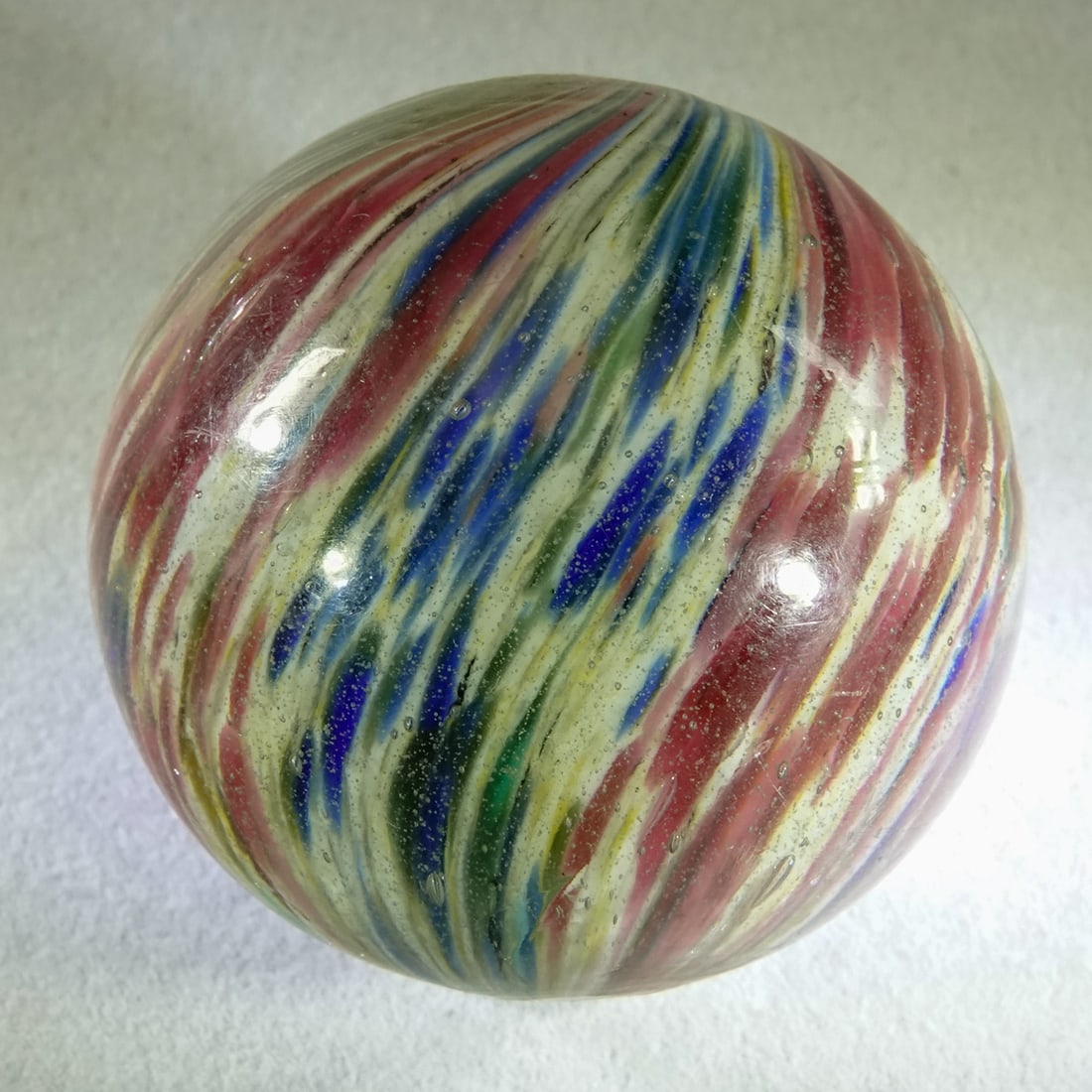 END OF DAY, Paneled Onionskin. 1-5/8". Mint (9.5).: END OF DAY, Paneled Onionskin. Four-Panel Onionskin. White core with a little yellow mixed in. two blue panels, two pink panels. A couple small annealing fractures, but no hits or damage to the surfac