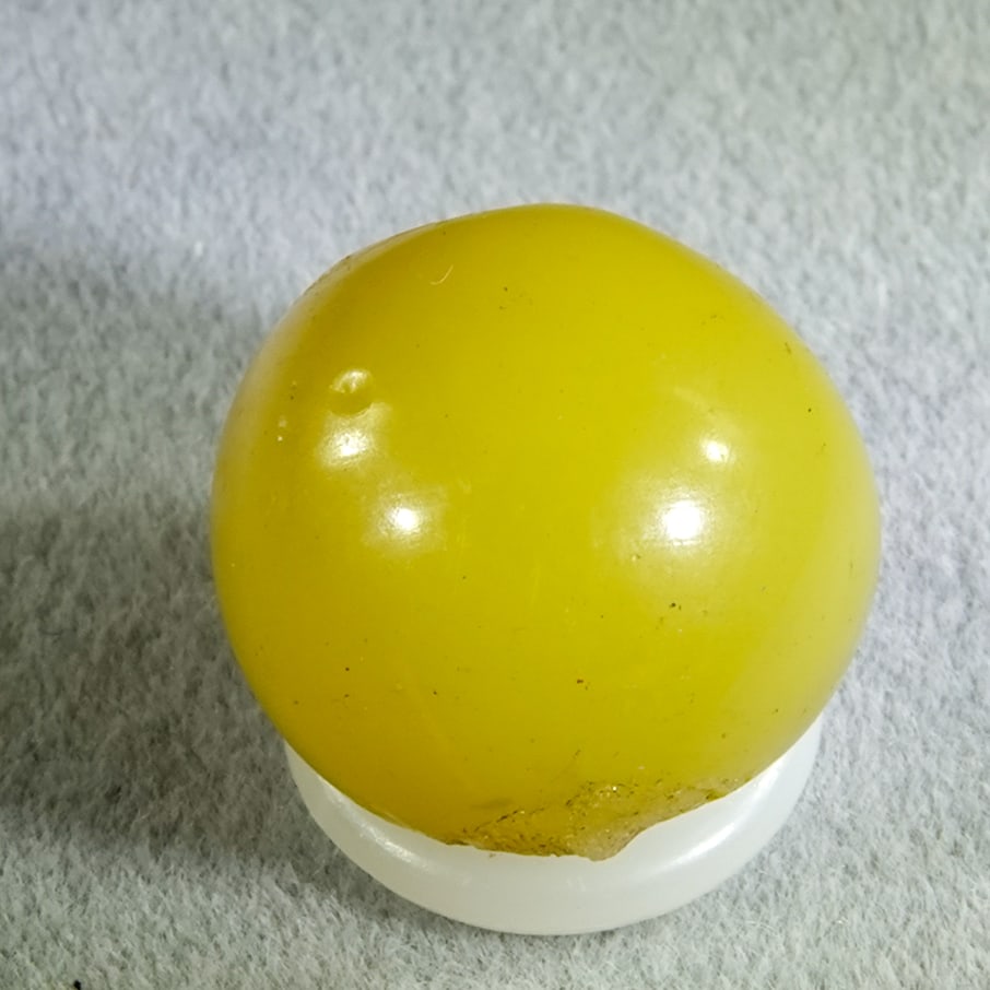 OTHER HANDMADE, Opaque. 9/16". Mint (9.9).: OTHER HANDMADE, Opaque. Two-pontil marble. Semi-opaque Custard Yellow Opaque. Germany, circa 1860-1920. 9/16". Mint (9.9).