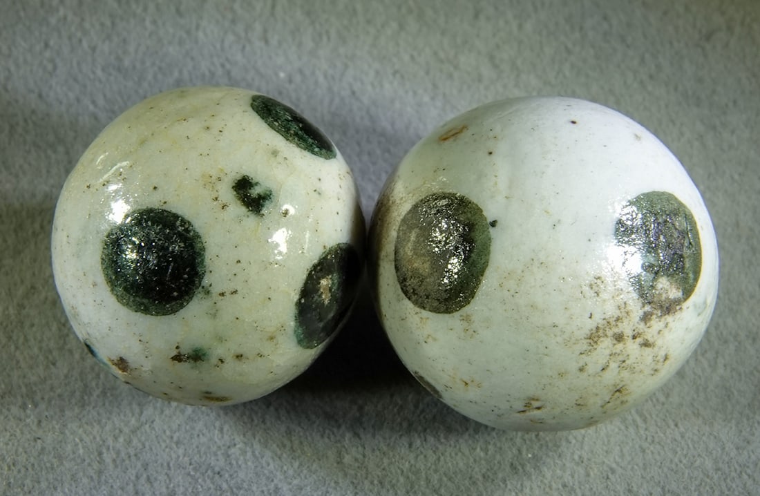 NON-GLASS HANDMADE, China. 2 marbles. (1 of 3)