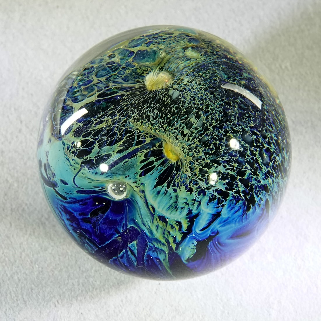 CONTEMPORARY HANDMADE, Josh Simpson. 1-7/16". Mint (9.9).: CONTEMPORARY HANDMADE, Josh Simpson. Planet. Signed "JS99". 1-7/16". Mint (9.9).