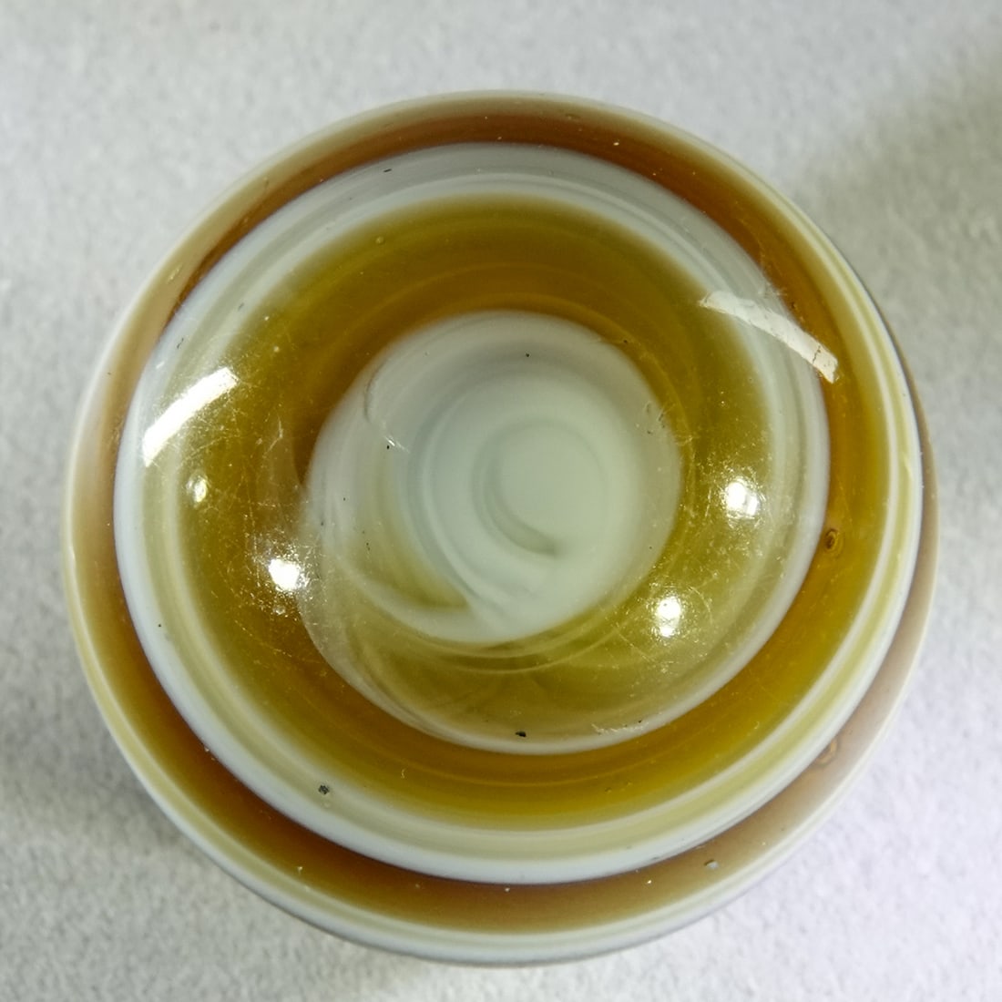 TRANSITIONAL, Melted Pontil. 1-7/16". Polished .: TRANSITIONAL, Melted Pontil. Handgathered Horizontal Slag. Polished. Pontil is gone. Remnants of a chip remain. Ohio, circa 1895-1910. 1-7/16". Polished .