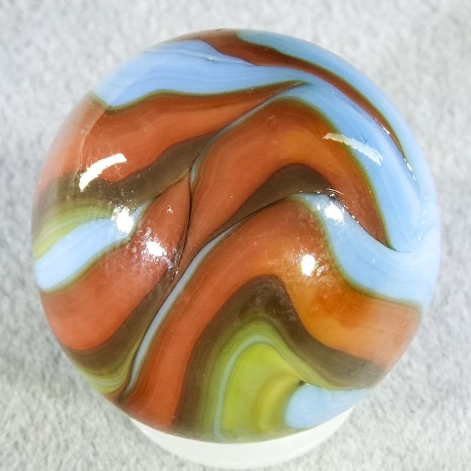 CHRISTENSEN AGATE COMPANY, Swirl. 23/32". Mint (9.9).: CHRISTENSEN AGATE COMPANY, Swirl. Shooter four-color Swirl. Some flame tips. Cambridge OH, circa 1925-1930. 23/32". Mint (9.9).
