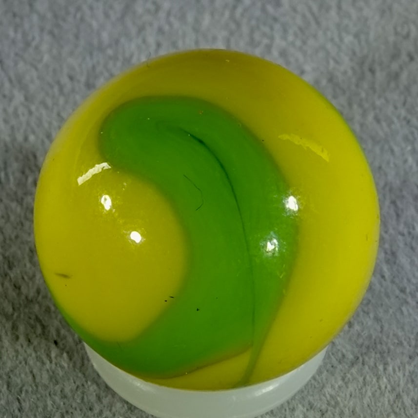 CHRISTENSEN AGATE COMPANY, Swirl. 5/8". Mint (9.9).: CHRISTENSEN AGATE COMPANY, Swirl. Green swirls in yellow. Cambridge OH, circa 1925-1930. 5/8". Mint (9.9).