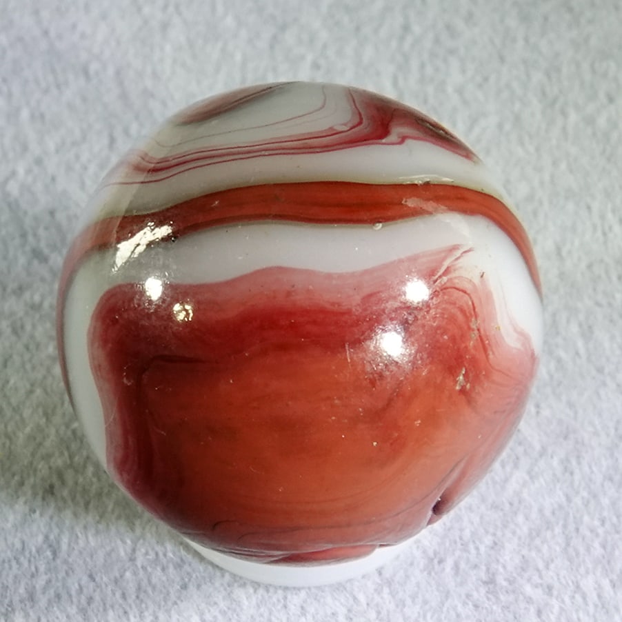 AKRO AGATE COMPANY, Swirl Oxblood. 21/32". Mint (9.9). (1 of 6)