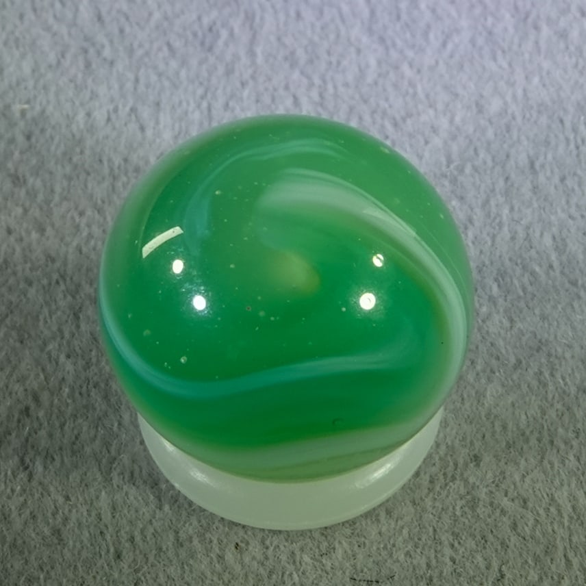 AKRO AGATE COMPANY, Ade. 9/16". Mint (9.9).: AKRO AGATE COMPANY, Ade. Limeade. Very fluorescent. Clarksburg WV, circa 1925-1935. ex-collection: Ralph Stagg 9/16". Mint (9.9).