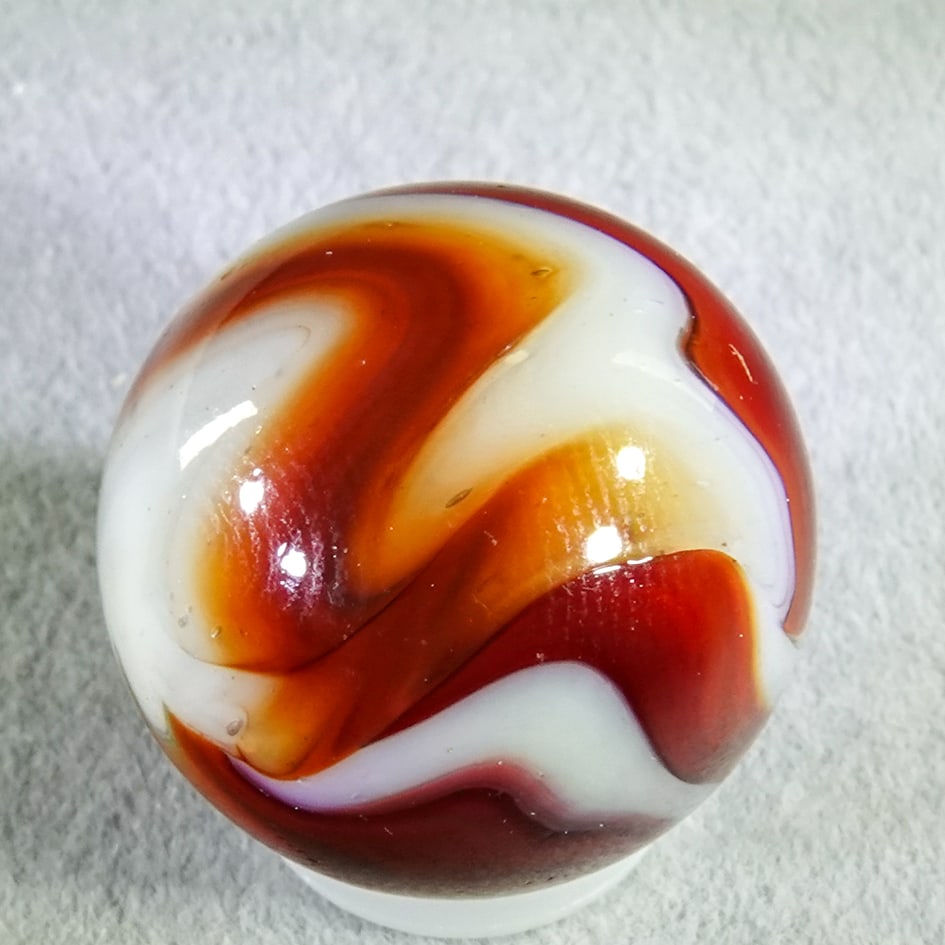 PELTIER GLASS COMPANY, National Line Rainbo. Ruby Rebel. 23/32". Mint (9.9). (1 of 6)