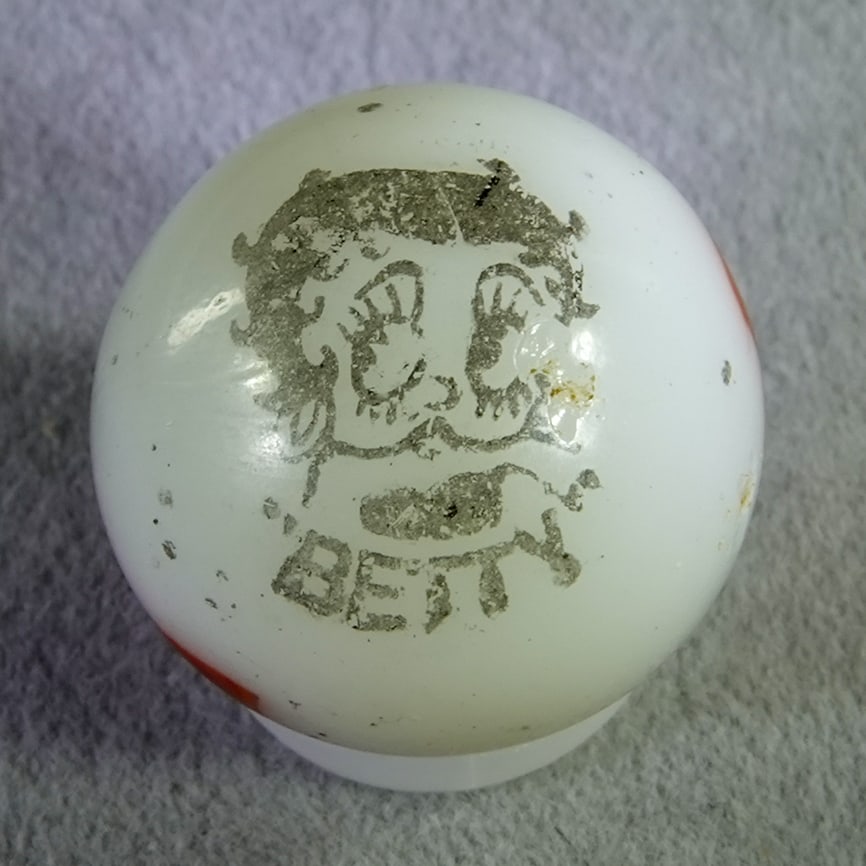 PELTIER GLASS COMPANY, Character Marble (comic). Betty. 11/16". Mint(-) (9.0). (1 of 6)