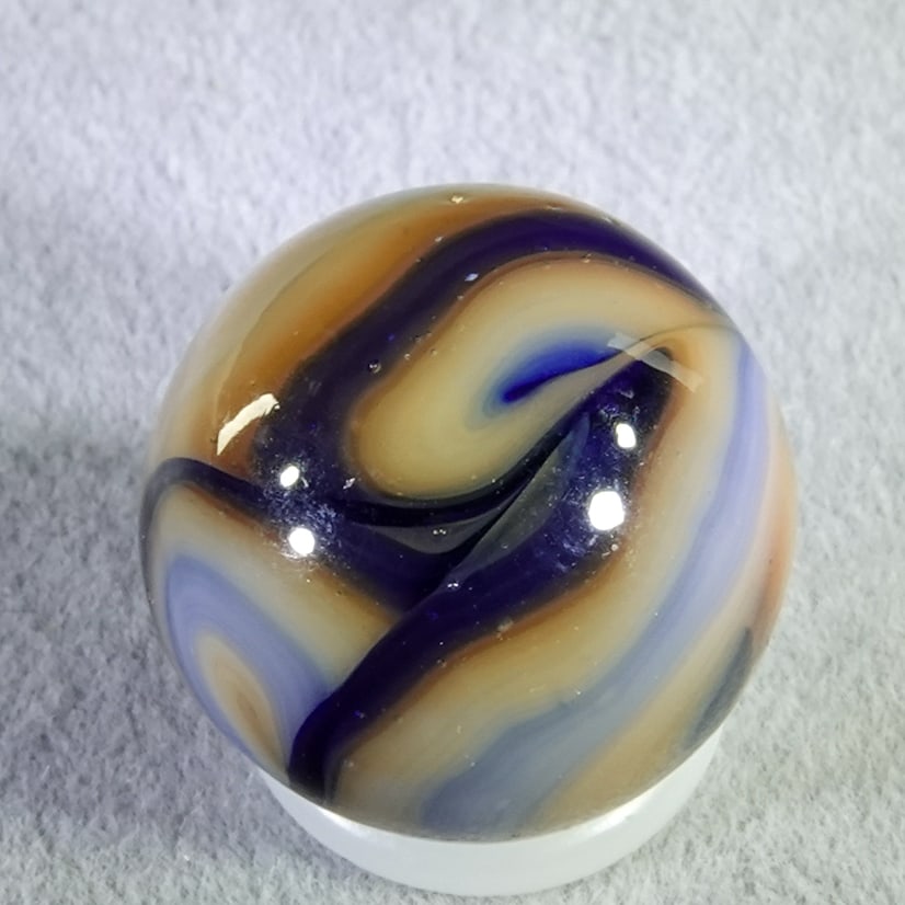 RAVENSWOOD NOVELTY WORKS, Swirl. Blue Raven. 5/8". Mint (9.9).: RAVENSWOOD NOVELTY WORKS, Swirl. Blue Raven. Ravenswood WV, circa 1930-1940. 5/8". Mint (9.9).