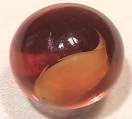 89296 BB Marbles: Peltier Root Beer Float 31/32: PELTIER GLASS COMPANY, Root Beer Float. Nova known as the Root Beer Float. Transparent brown marble with wide opaque white ribbon in it. Limited run by Peltier. Ottawa IL, 1979. 31/32". Mint (9.9).