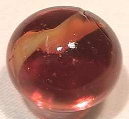 89300 BB Marbles: Peltier Root Beer Float 31/32: PELTIER GLASS COMPANY, Root Beer Float. Nova known as the Root Beer Float. Transparent brown marble with wide opaque white ribbon in it. Limited run by Peltier. Ottawa IL, 1979. 31/32". Mint (9.9).