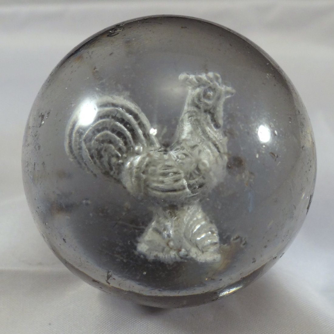 Marbles: Lot 90.  SULPHIDE. Rooster. Buffed . 2-1/8". (1 of 4)