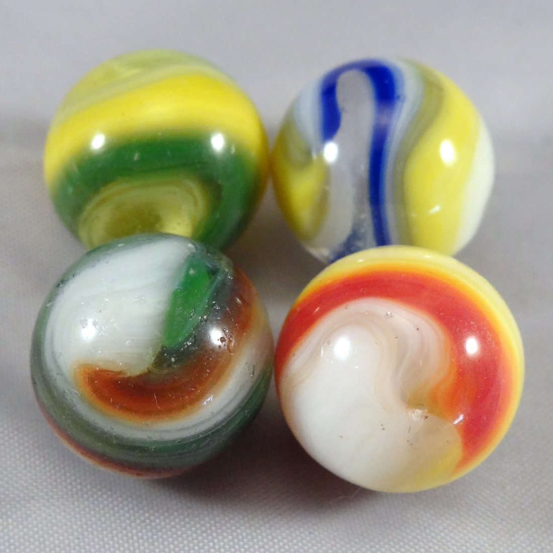 . Four Akro Agate Popeye Corkscrews. (1 of 1)