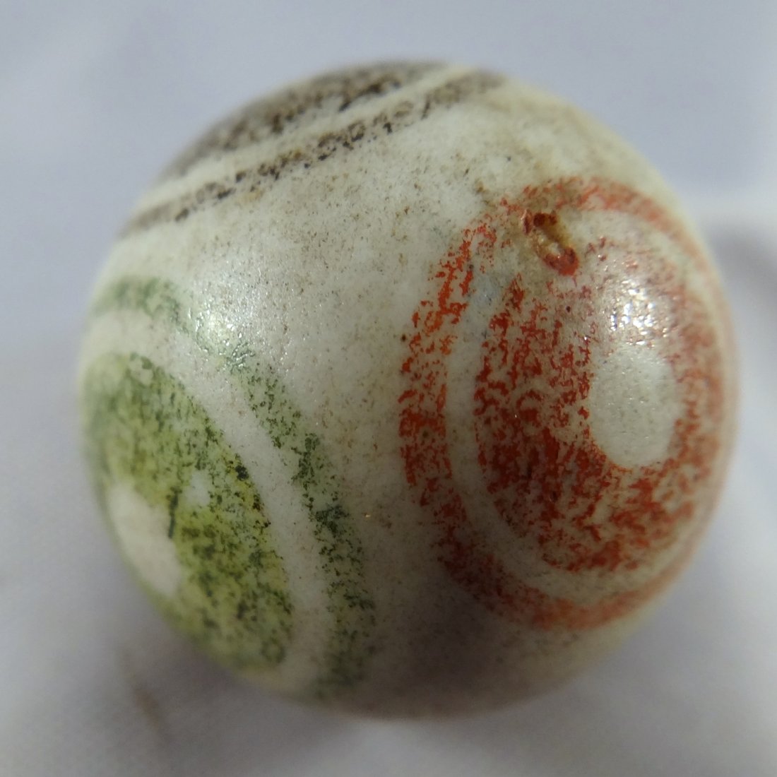 . China. Bullseye. 25/32". M 9.9 (1 of 4)