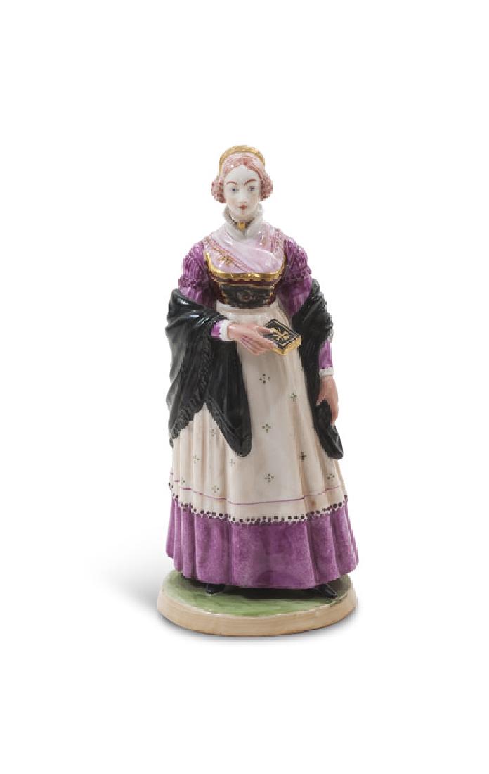 Nymphenburg Münchner Bürgersfrau in Sonntagstracht mit: Nymphenburg Münchner Bürgersfrau in Sonntagstracht mit Gebetbuch. Ausführung Nymphenburg um 1900, Entwurf Eugen Napoleon Neureuther um 1850. Polychrome Aufglasur- und partielle Goldstaffage. Höhe