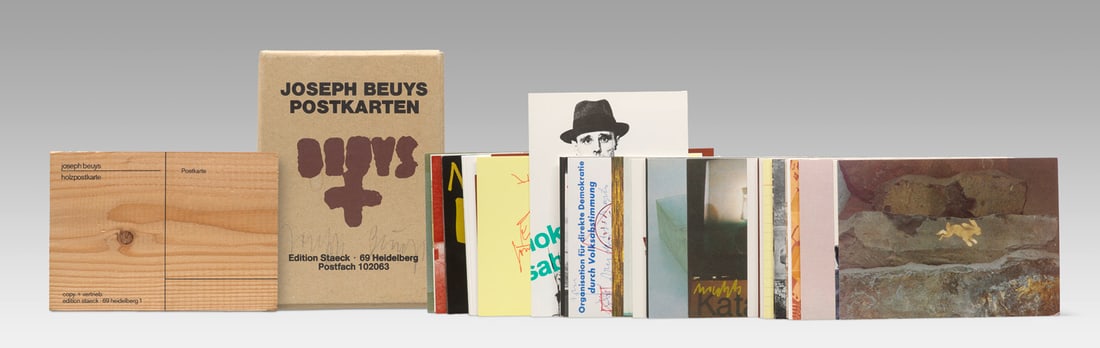 Joseph Beuys Holzpostkarte. 1974. Multiple aus Kiefernholz. 10,2 x 14,8 x 3,3 cm. Signiert und: FluxusJoseph BeuysHolzpostkarte. 1974. Multiple aus Kiefernholz. 10,2 x 14,8 x 3,3 cm. Signiert und typographische bezeichnet. - Stellenweise dezente Kratzer und Bestoßungen. Insgesamt sehr gut.S