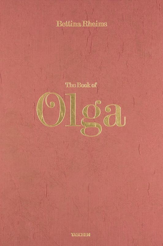 Rheims, Bettina The Book of Olga. Köln, Taschen Verlag,: Rheims, Bettina The Book of Olga. Köln, Taschen Verlag, 2008. 154 S. mit zahlr. photographischen Abb. 2° Stoffbezug mit goldgepr. Titel u. mont. Abb. auf VDeckel u. Goldschnitt, in stoffbezogener OK