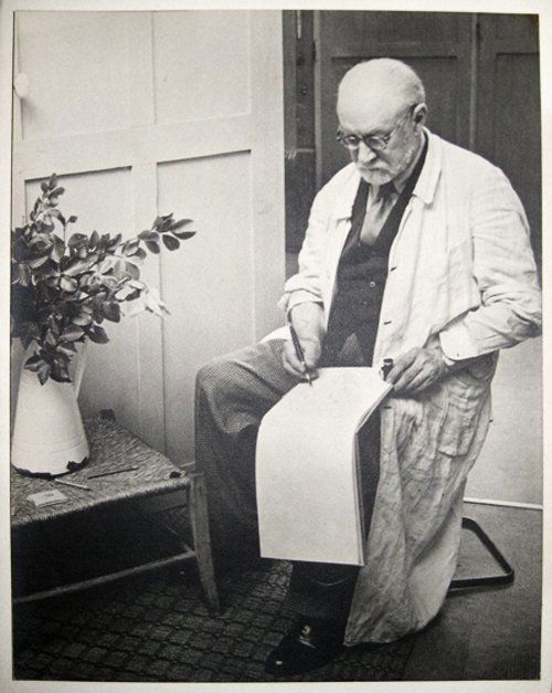 Brassai - Henri Matisse Sketching: Silver Gelatin print, 1939, accompanied by a printed sheet on green paper stating “Photographie Originale de Matisse par Brassai” Note: This is the photograph which comes separately and framed alo