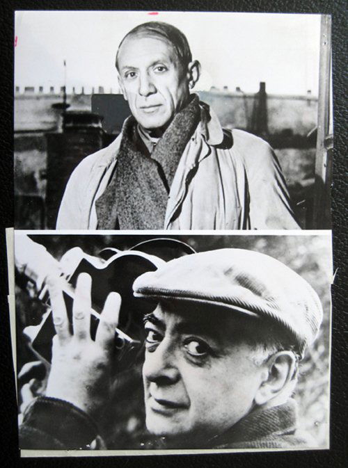 Brassai - Picasso facing / Brassai holding his came: 2 Vintage Silver Gelatin prints, on the same paper date stamped Feb 7 1967 with fact sheet attached verso Size: Brassai portrait 170 x 120 mms, Picasso portrait 170 x 115 mms (all 23.5 x 16.7 cms) Not