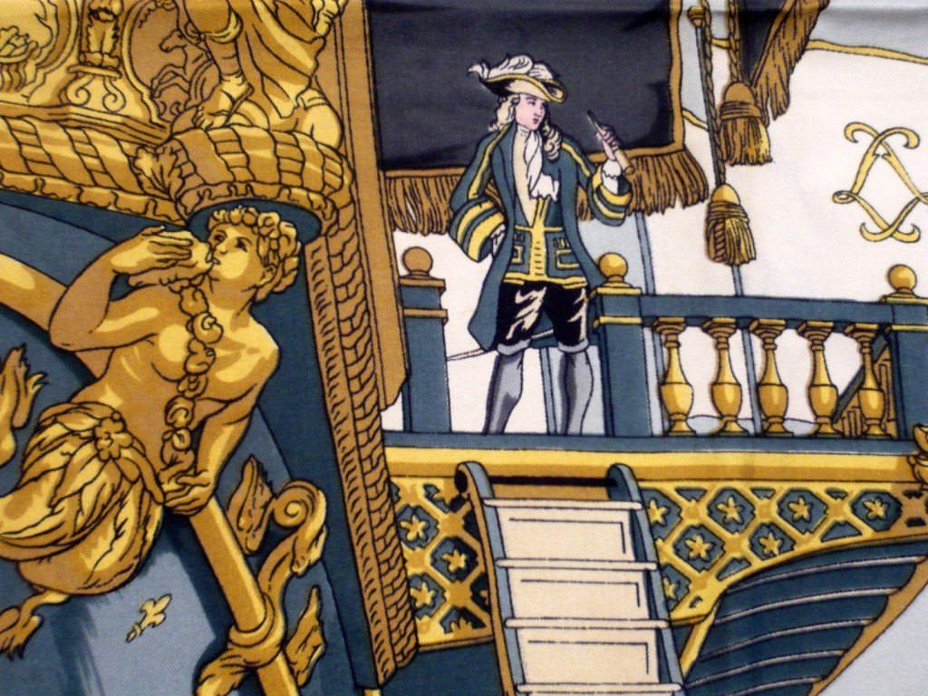 HERMES Paris "Vue du Carosse de la Galère la Réale" by : HERMES Paris "Vue du Carosse de la Galère la Réale" by Hugo Grygkar Black silk scarf (used feeling, stains) Carré en soie noire (taches)