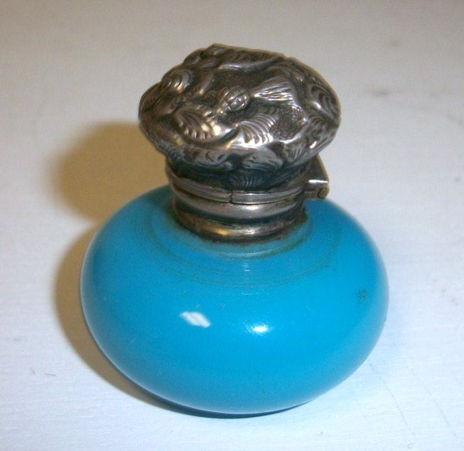 Thomas Webb Powder bottle: 1" tall powder bottle turquois opaque glass w/sterling floral cap and collar polished bottom attr to T. Webb